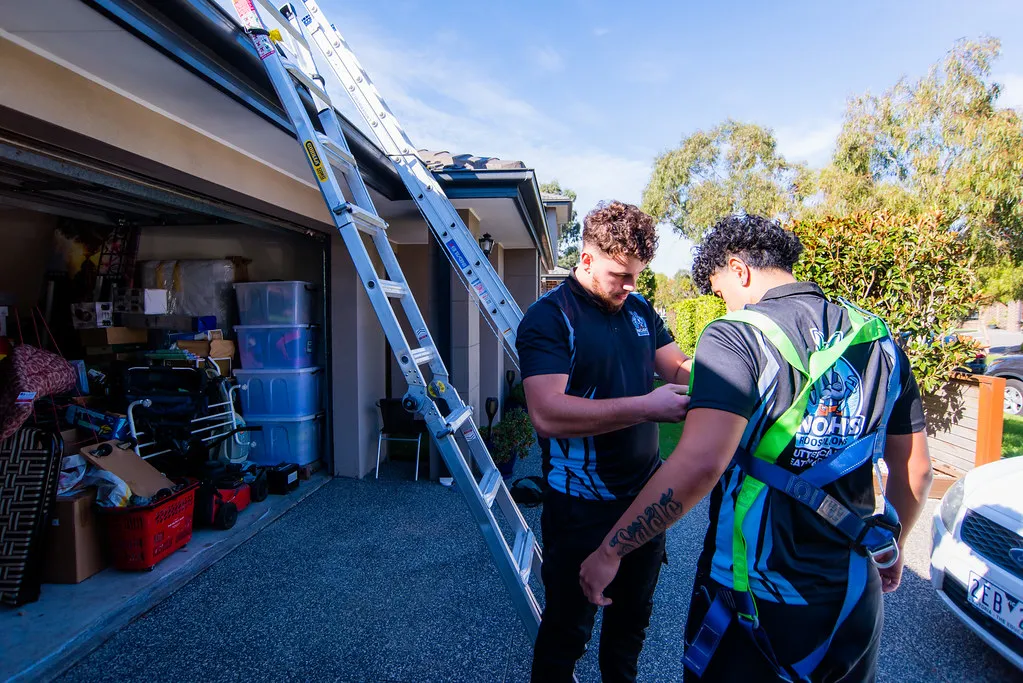 Setting up ladders at residential home