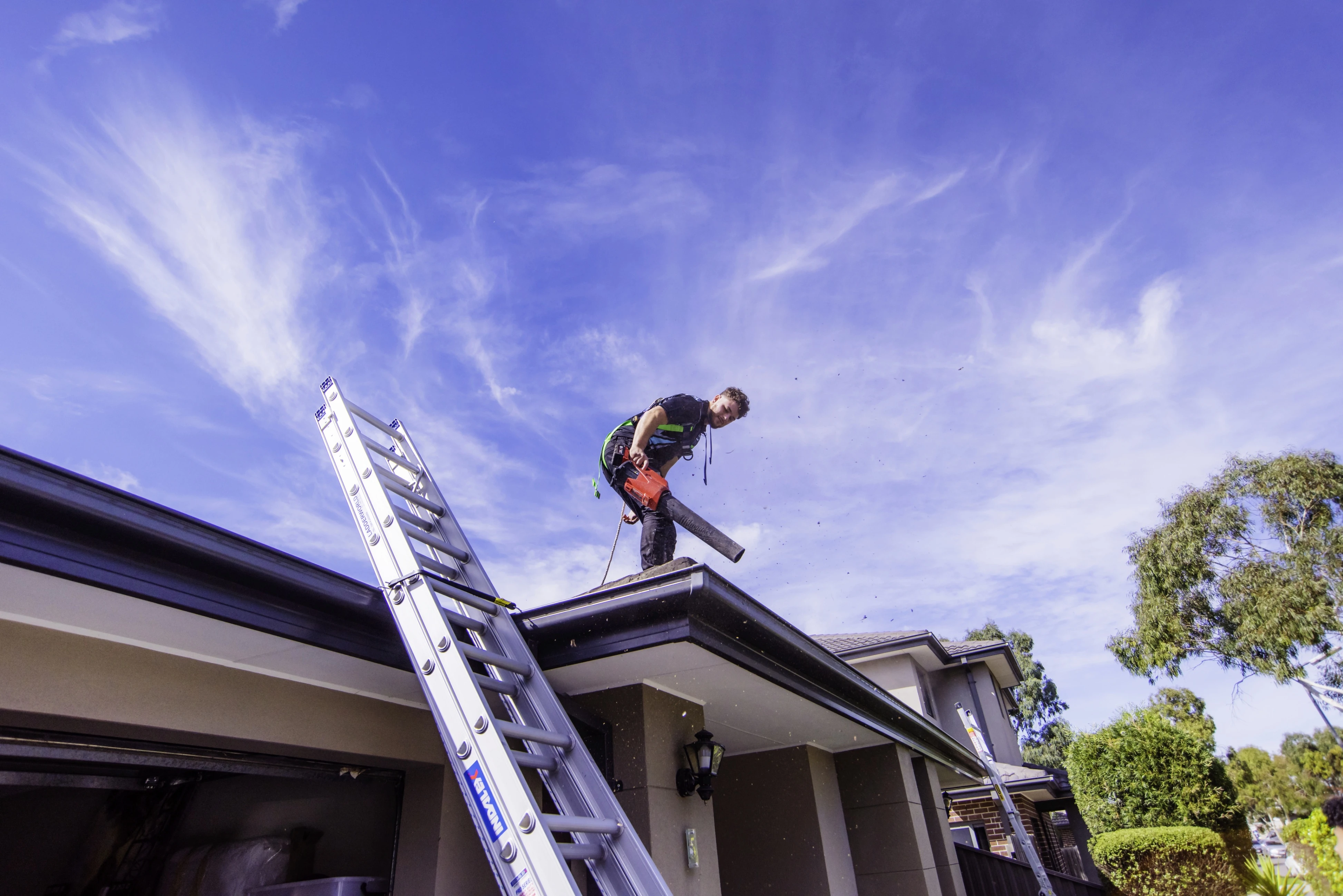 Noah's Roosolutions team working on a Melbourne rooftop